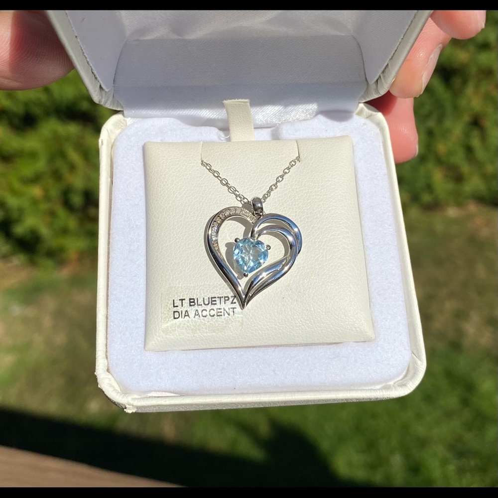 Sterling Silver Light Blue Topaz & Diamond Accent Heart Pendant